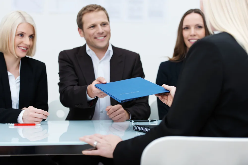 Office team meeting around a conference table