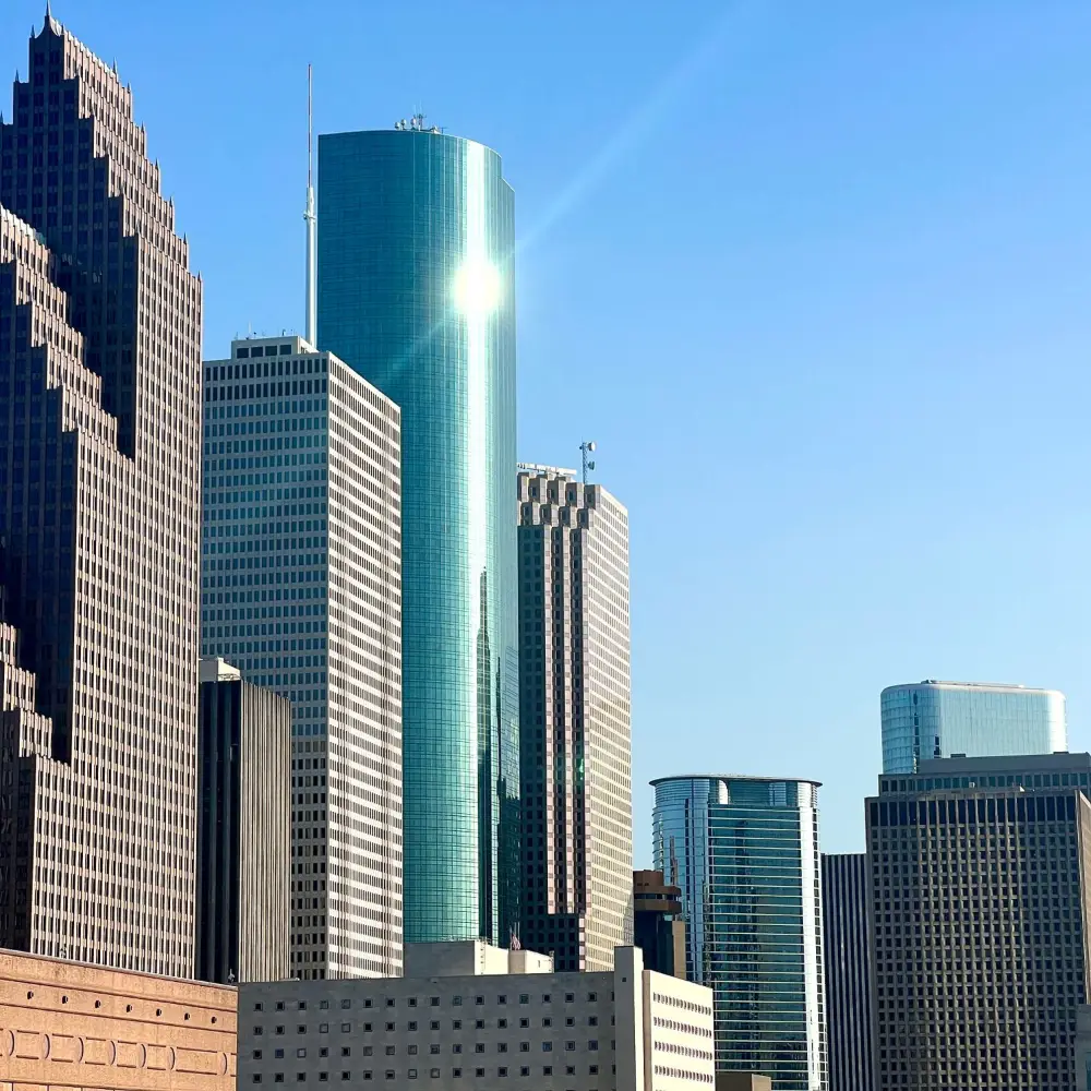 Downtown Houston office towers against a blue sky