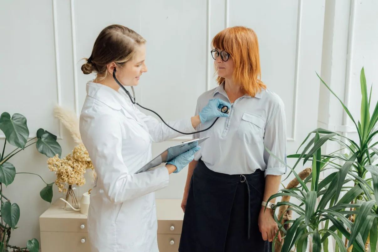Doctor examining a patient with a stethoscope