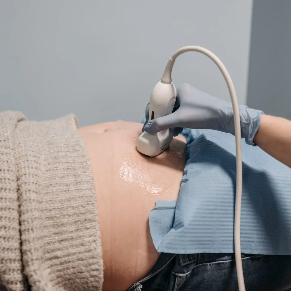 Ultrasound scan on a pregnant patient's abdomen